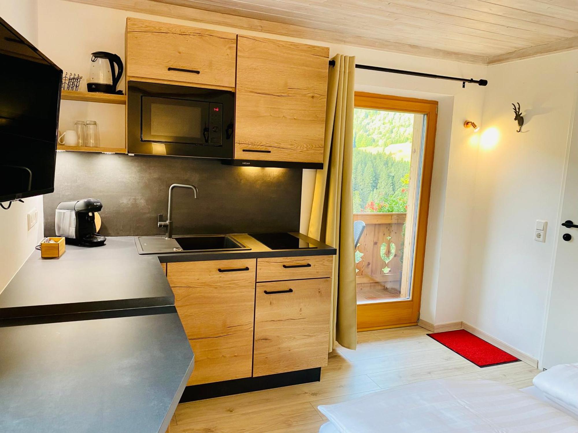 Alm Seasons Premium Chalet & Studios Saalbach Zimmer foto